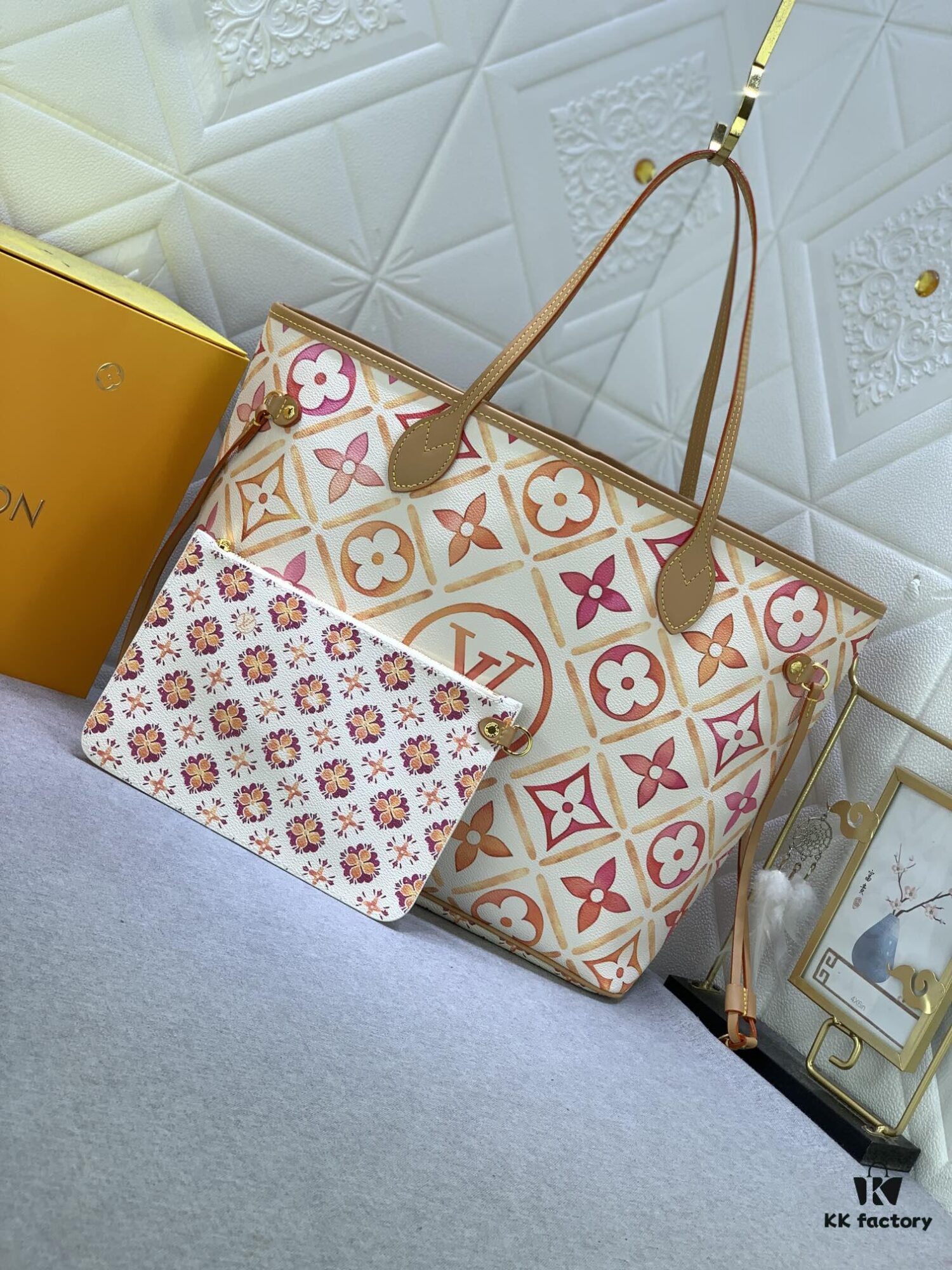 693067c76e68136f4d9a4aac Upgraded Original M25317 M11263 M40995 This Medium Neverfull Tote Bag Features a Monogram Tiles Canvas Construction with Leather Trims Defining the Top and Handles