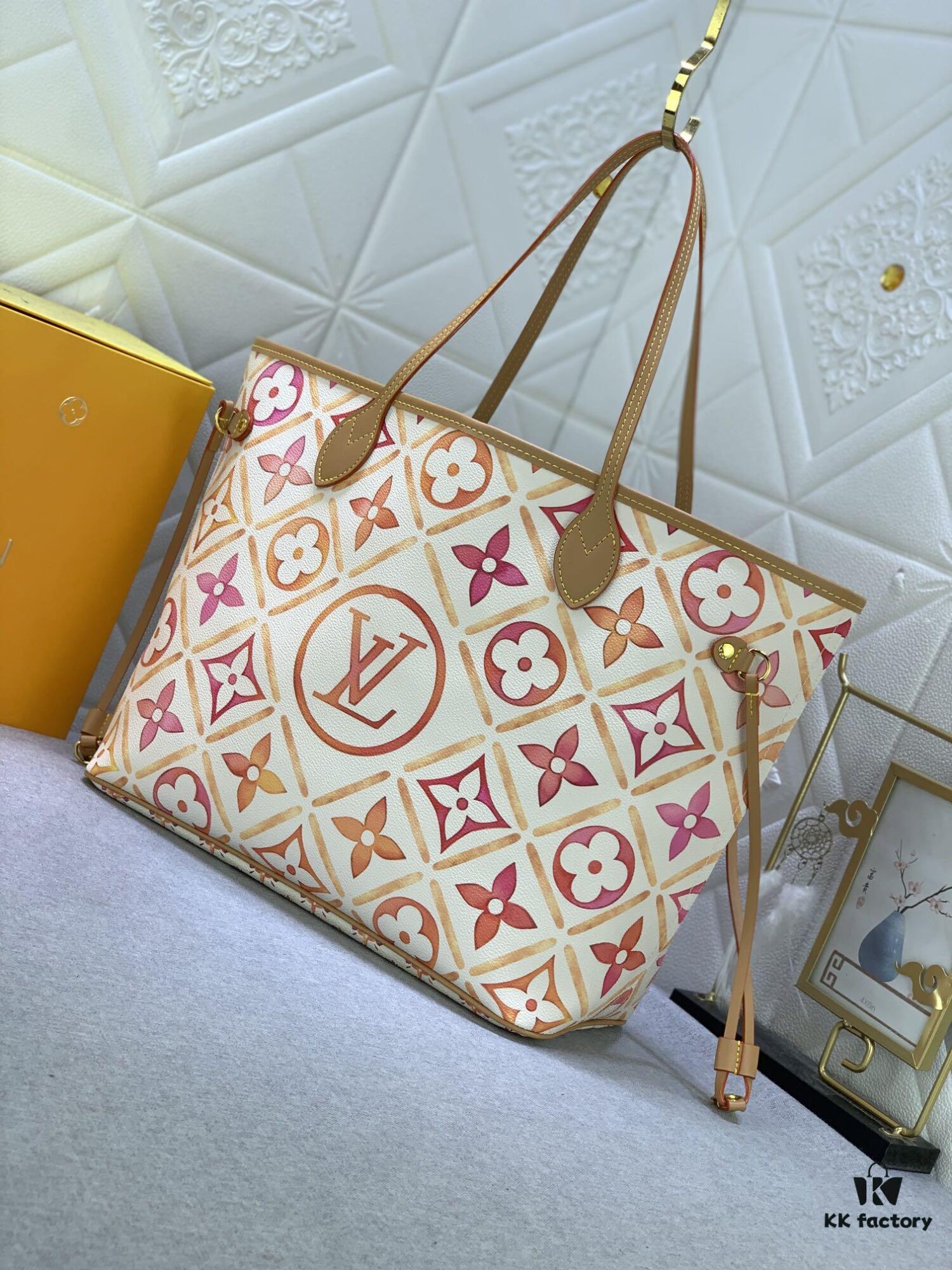 693067c86e68136f4d9a4aad Upgraded Original M25317 M11263 M40995 This Medium Neverfull Tote Bag Features a Monogram Tiles Canvas Construction with Leather Trims Defining the Top and Handles