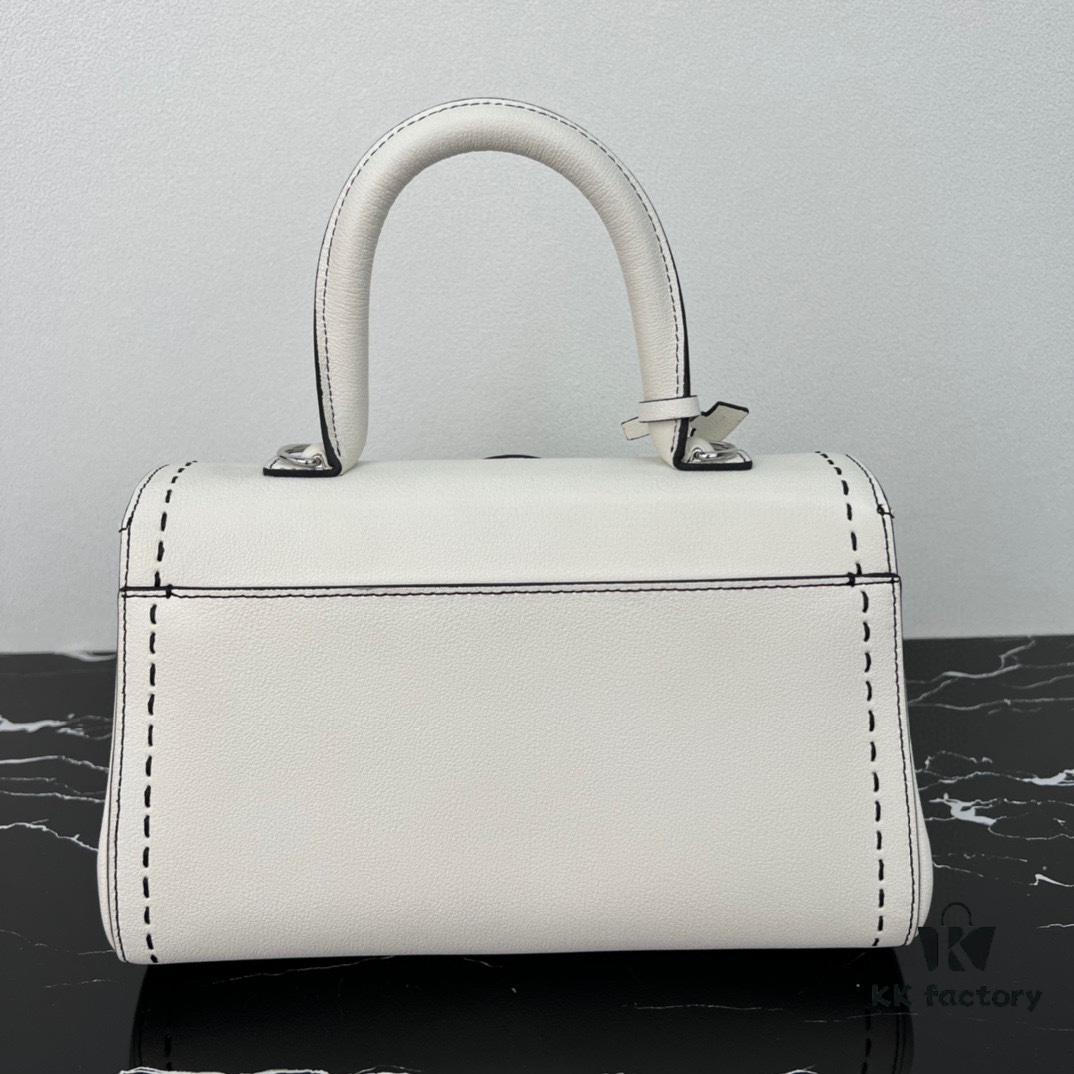 693068636e68136f4d9a4b99 Delvaux 2024 Spring-Summer Exposed Stitching Collection Brillant PM Bag in Caramel