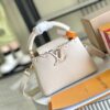 6930691b6e68136f4d9a4cb4 Capucines Mini Handbag with Detachable Strap, Full-Grain Taurillon Leather with Monogram Flowers and Mother-of-Pearl Details