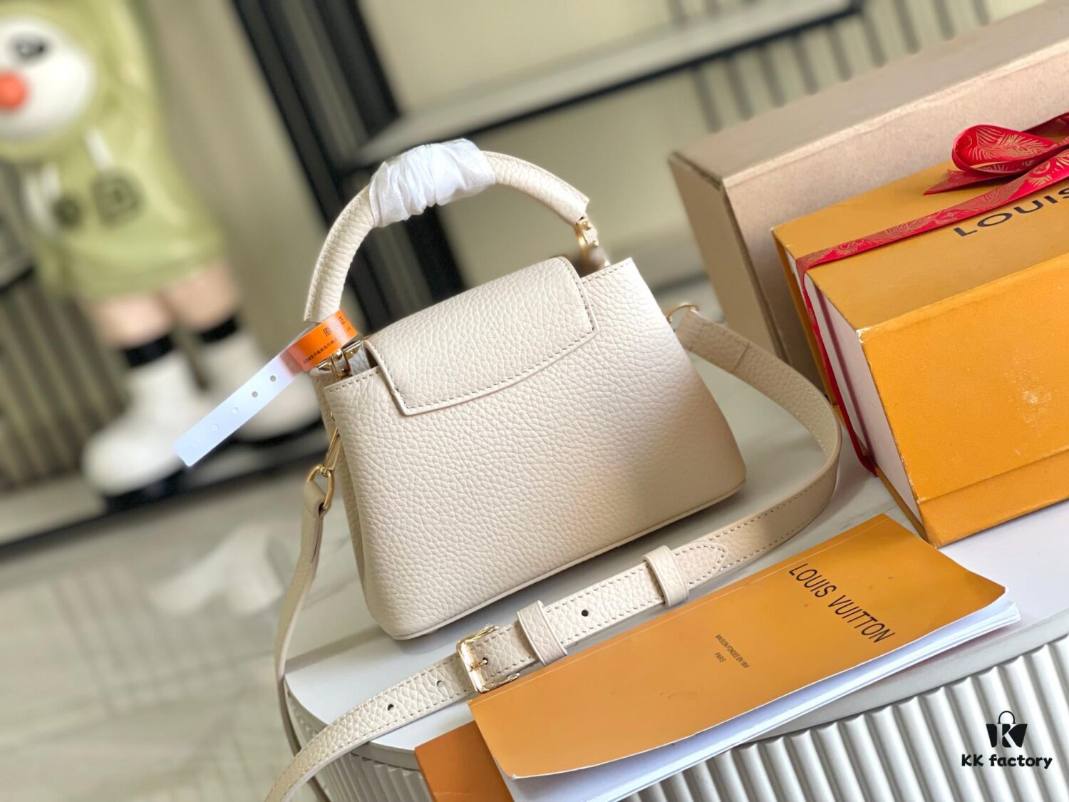 6930691d6e68136f4d9a4cb7 Capucines Mini Handbag with Detachable Strap, Full-Grain Taurillon Leather with Monogram Flowers and Mother-of-Pearl Details