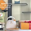 693069246e68136f4d9a4cc5 Capucines Mini Handbag with Detachable Strap, Full-Grain Taurillon Leather with Monogram Flowers and Mother-of-Pearl Details