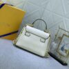 69306a1b6e68136f4d9a4e92 Upgraded Original M22626 M21088 M21052 M20997 This Season, the Compact Lockme Ever Mini Bag Features Fashionable New Hues in Grained Calfskin Leather