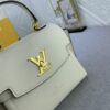 69306a1b6e68136f4d9a4e94 Upgraded Original M22626 M21088 M21052 M20997 This Season, the Compact Lockme Ever Mini Bag Features Fashionable New Hues in Grained Calfskin Leather