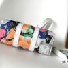 69306a5d6e68136f4d9a4f15 Keepall Bandoulière 25 Bag from LV Portrait Collection M46678 Eyes M46701 White Flowers Exclusive Original Order