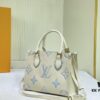 69306a6f6e68136f4d9a4f38 Upgraded Original M46833 White M45653 White Embossed M46569 This OnTheGo PM Bag Features Monogram Empreinte Leather with Subtle Tones Highlighting the LV Initials and Monogram Flowers Embossing Giving a Compact Square Silhouette a Delicate Sheen
