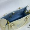 69306a736e68136f4d9a4f41 Upgraded Original M46833 White M45653 White Embossed M46569 This OnTheGo PM Bag Features Monogram Empreinte Leather with Subtle Tones Highlighting the LV Initials and Monogram Flowers Embossing Giving a Compact Square Silhouette a Delicate Sheen