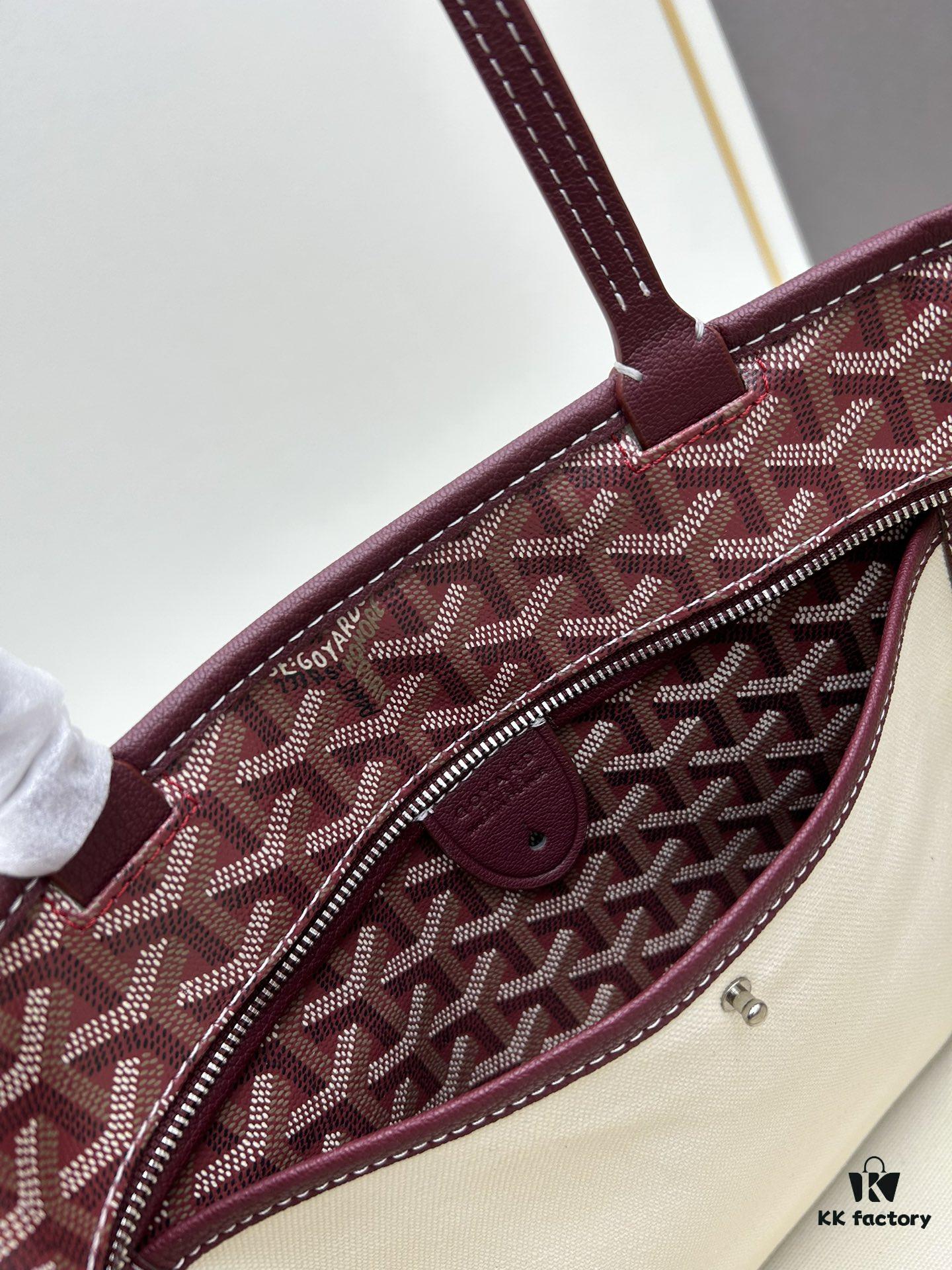 69306bbc6e68136f4d9a515c Small Artois Small Bag (Zippered Tote) – a tribute to the iconic Saint Louis bag, featuring a structured design with enhanced security and privacy through leather corner guards and a zip closure. It includes a removable interior pouch for organizing your belongings. The Artois Small Bag has longer handles than the Saint Louis Small Bag, offering easier carrying.