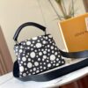 69306d7b6e68136f4d9a54c0 Upgraded Version M21663 This LV x YK Capucines Small Handbag from the Louis Vuitton x Yayoi Kusama Collaboration Collection