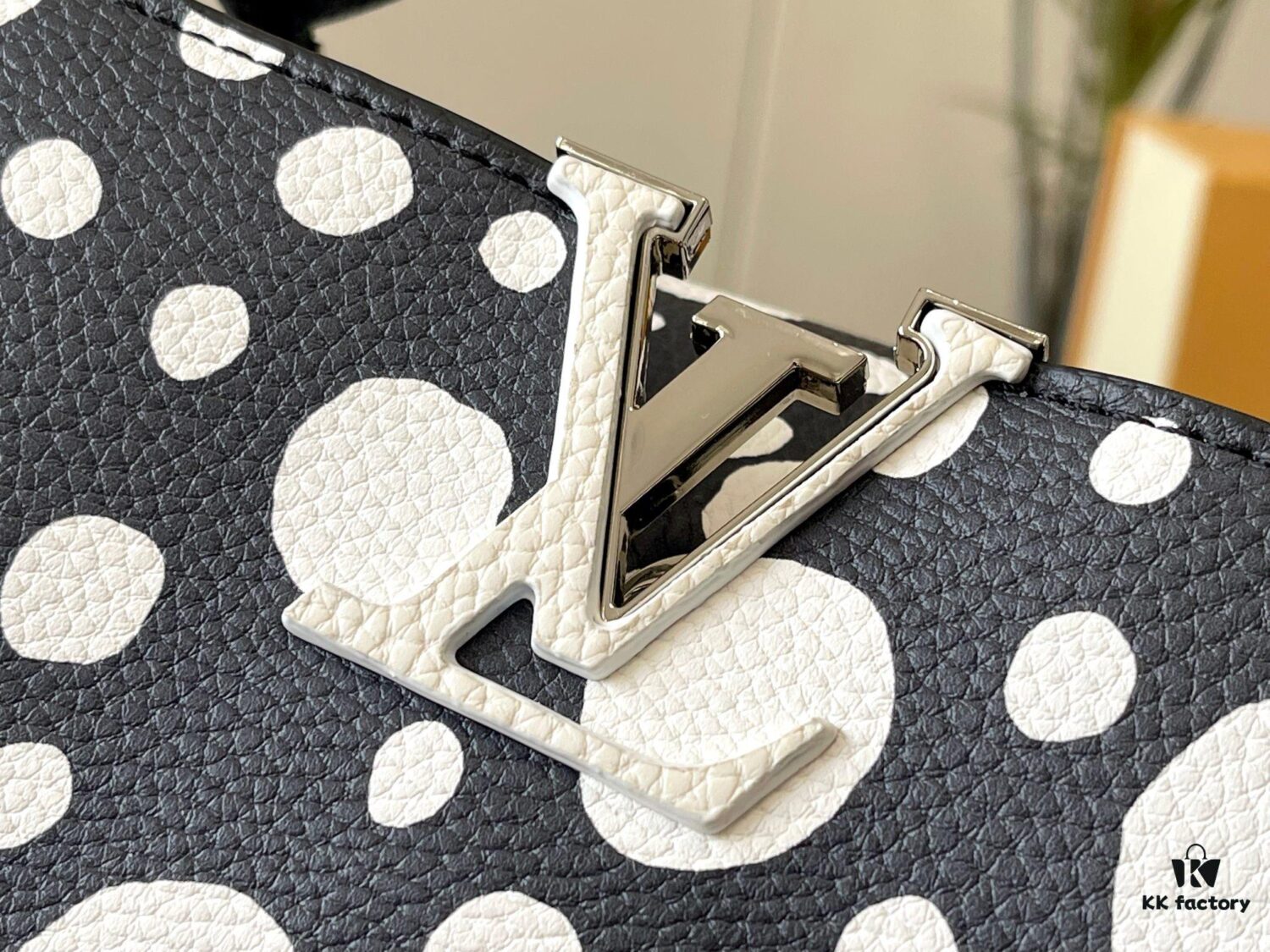 69306d7c6e68136f4d9a54c1 Upgraded Version M21663 This LV x YK Capucines Small Handbag from the Louis Vuitton x Yayoi Kusama Collaboration Collection