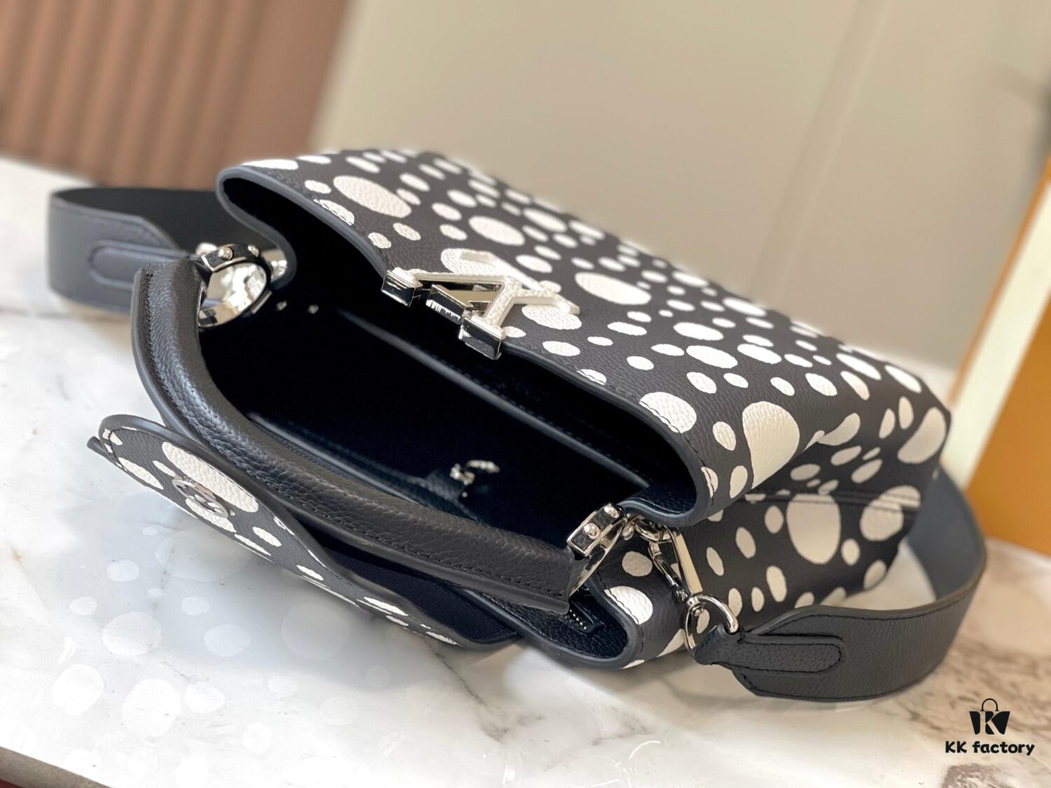 69306d7e6e68136f4d9a54c5 Upgraded Version M21663 This LV x YK Capucines Small Handbag from the Louis Vuitton x Yayoi Kusama Collaboration Collection