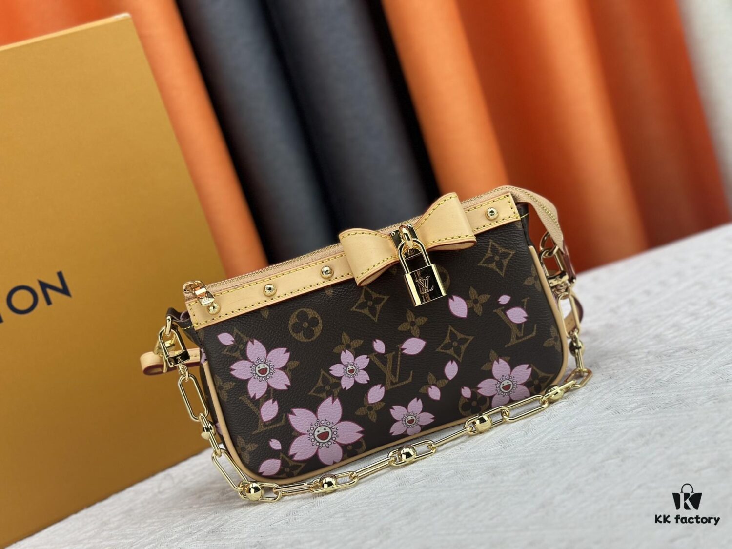 69306f366e68136f4d9a573c M13666 Pochette Accessoires Bag – A playful interpretation of the iconic Monogram canvas with Takashi Murakami's vibrant Cherry Blossom motif, revisiting the Louis Vuitton x Murakami collaboration with bold, whimsical style.
