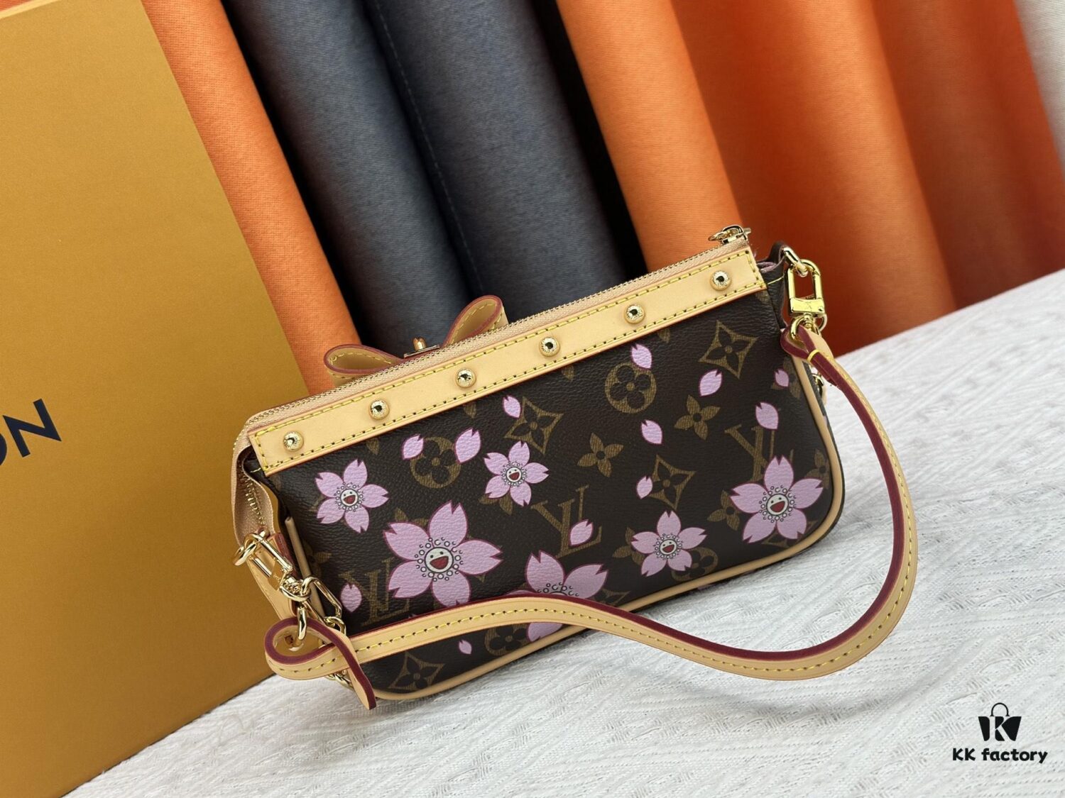 69306f386e68136f4d9a573f M13666 Pochette Accessoires Bag – A playful interpretation of the iconic Monogram canvas with Takashi Murakami's vibrant Cherry Blossom motif, revisiting the Louis Vuitton x Murakami collaboration with bold, whimsical style.