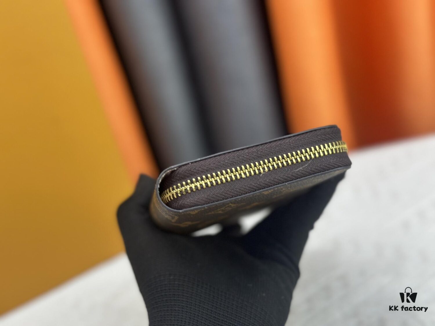 69306fe26e68136f4d9a5838 Wallet M60017 Umbrella M80857 M81544 This collectible multicolored zip-around wallet is crafted from Monogram canvas from the Vivienne Holidays 2022 collection, featuring an exquisite print of Louis Vuitton's mascot Vivienne standing in front of the brand's avant-garde Tokyo boutique with Japan's iconic Mount Fuji in the background. This vibrant high-end wallet serves as an invitation to journey and makes a perfect gift.