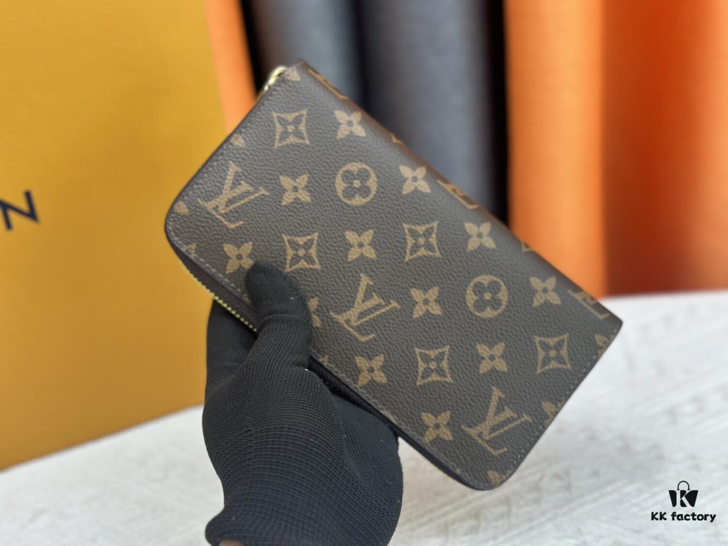 69306fe36e68136f4d9a583e Wallet M60017 Umbrella M80857 M81544 This collectible multicolored zip-around wallet is crafted from Monogram canvas from the Vivienne Holidays 2022 collection, featuring an exquisite print of Louis Vuitton's mascot Vivienne standing in front of the brand's avant-garde Tokyo boutique with Japan's iconic Mount Fuji in the background. This vibrant high-end wallet serves as an invitation to journey and makes a perfect gift.