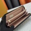 69306fe86e68136f4d9a5849 Wallet M60017 Umbrella M80857 M81544 This collectible multicolored zip-around wallet is crafted from Monogram canvas from the Vivienne Holidays 2022 collection, featuring an exquisite print of Louis Vuitton's mascot Vivienne standing in front of the brand's avant-garde Tokyo boutique with Japan's iconic Mount Fuji in the background. This vibrant high-end wallet serves as an invitation to journey and makes a perfect gift.