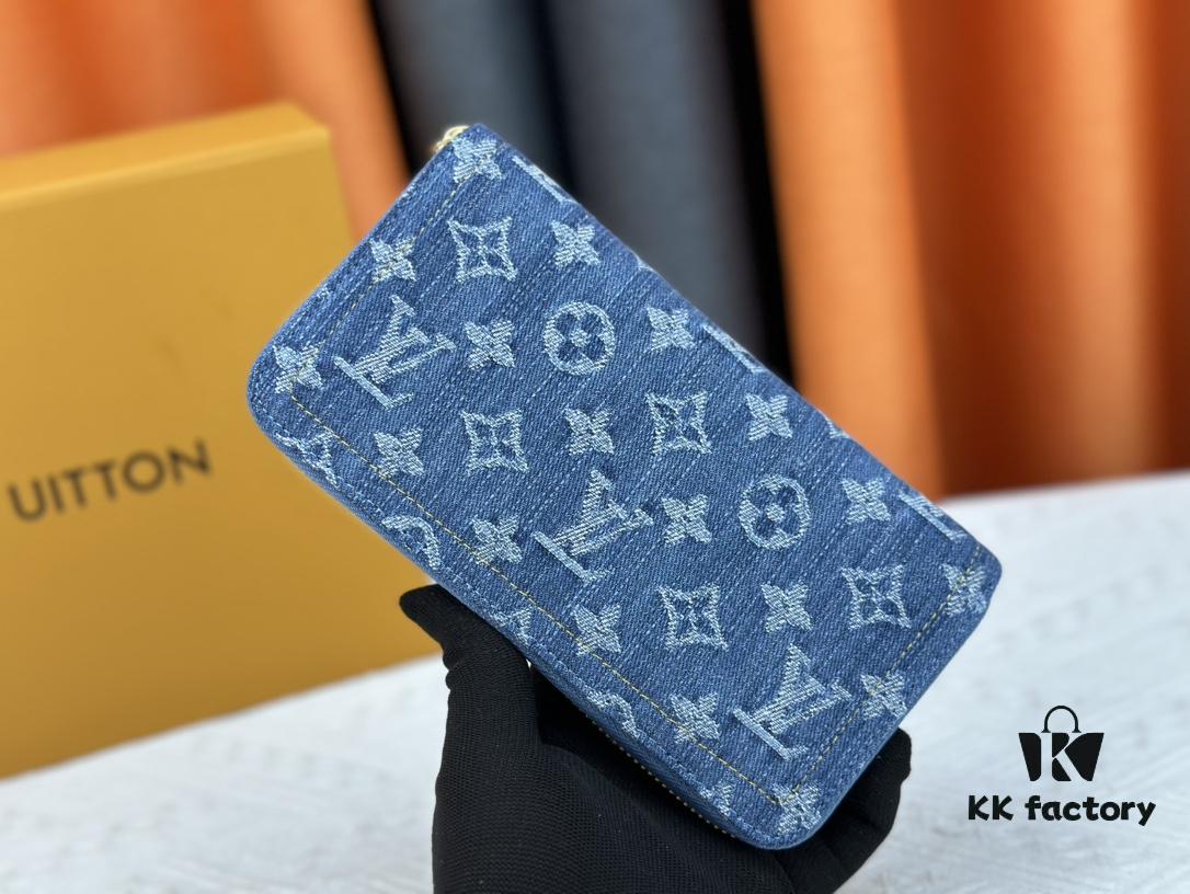 693070766e68136f4d9a5920 M82958 Blue Denim Zippy Wallet Collection