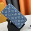 693070766e68136f4d9a5921 M82958 Blue Denim Zippy Wallet Collection