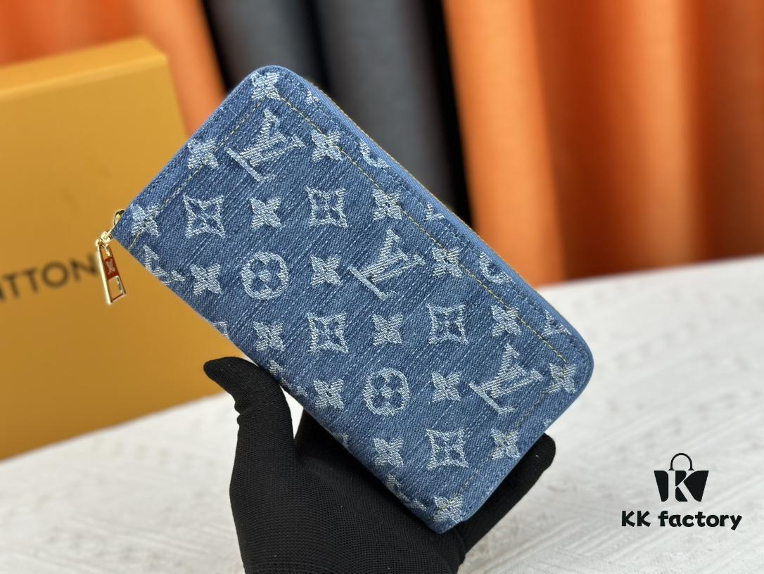 693070766e68136f4d9a5921 M82958 Blue Denim Zippy Wallet Collection