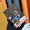 693070926e68136f4d9a595b Wallet M60410 Monogram Bird 👏👏 Vivienne Holidays 2022 Collection Passport Holder Celebrating Louis Vuitton's Travel Spirit