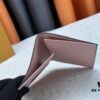 693070996e68136f4d9a5967 Wallet M60410 Sakura Pink 👏👏 Vivienne Holidays 2022 Collection Passport Holder Celebrates Louis Vuitton's Travel Spirit