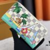 693070ee6e68136f4d9a5a1e Wallet M82839 White Check This collectible multi-compartment zip wallet is crafted from Monogram canvas from the Vivienne Holidays 2022 collection, featuring a delicate print of Vivienne, Louis Vuitton's mascot, standing in front of the brand's avant-garde Tokyo boutique with Japan's iconic Mount Fuji in the background. This vibrant high-end wallet feels like an invitation to travel and makes a perfect gift.