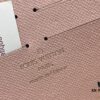 693070f16e68136f4d9a5a26 Wallet M82839 White Check This collectible multi-compartment zip wallet is crafted from Monogram canvas from the Vivienne Holidays 2022 collection, featuring a delicate print of Vivienne, Louis Vuitton's mascot, standing in front of the brand's avant-garde Tokyo boutique with Japan's iconic Mount Fuji in the background. This vibrant high-end wallet feels like an invitation to travel and makes a perfect gift.
