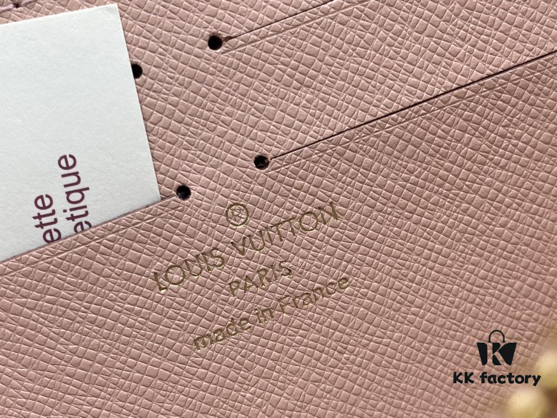 693070f16e68136f4d9a5a26 Wallet M82839 White Check This collectible multi-compartment zip wallet is crafted from Monogram canvas from the Vivienne Holidays 2022 collection, featuring a delicate print of Vivienne, Louis Vuitton's mascot, standing in front of the brand's avant-garde Tokyo boutique with Japan's iconic Mount Fuji in the background. This vibrant high-end wallet feels like an invitation to travel and makes a perfect gift.