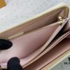 693070f26e68136f4d9a5a29 Wallet M82839 White Check This collectible multi-compartment zip wallet is crafted from Monogram canvas from the Vivienne Holidays 2022 collection, featuring a delicate print of Vivienne, Louis Vuitton's mascot, standing in front of the brand's avant-garde Tokyo boutique with Japan's iconic Mount Fuji in the background. This vibrant high-end wallet feels like an invitation to travel and makes a perfect gift.