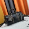 6930717e6e68136f4d9a5b51 Keepall 25 Handbag in Monogram Eclipse Reverse Denim Canvas with Leather Trim