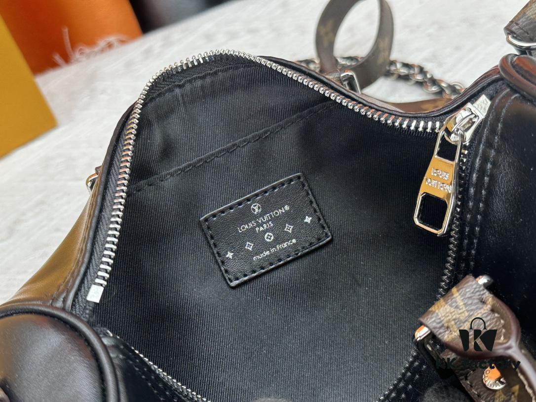 693071806e68136f4d9a5b52 Keepall 25 Handbag in Monogram Eclipse Reverse Denim Canvas with Leather Trim