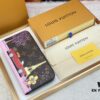693072fc6e68136f4d9a5e5c M81630. 👏👏Vivienne Holidays 2022 Collection Limited Edition Zippy Single Compartment Wallet, Showcasing Louis Vuitton's Travel Heritage
