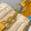 Upgraded M11617 Capucines BB Handbag featuring a woven rattan design inspired by the 1892 Louis Vuitton picnic trunk, crafted with cowhide leather handles and flap, metallic LV logo, detachable and adjustable leather shoulder strap for crossbody wear. Packaging may vary based on availability.