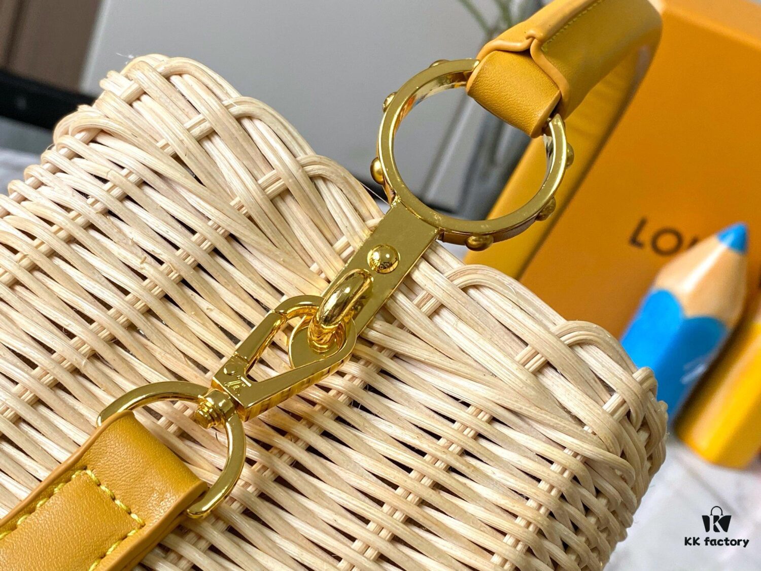 Upgraded M11617 Capucines BB Handbag featuring a woven rattan design inspired by the 1892 Louis Vuitton picnic trunk, crafted with cowhide leather handles and flap, metallic LV logo, detachable and adjustable leather shoulder strap for crossbody wear. Packaging may vary based on availability.