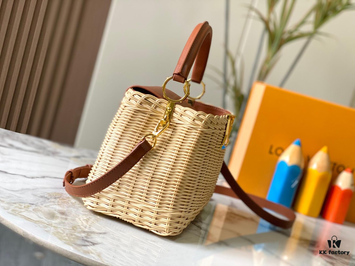 693073746e68136f4d9a5f1e Upgraded M11617 Capucines BB Handbag featuring a woven rattan design inspired by the 1892 Louis Vuitton picnic trunk
