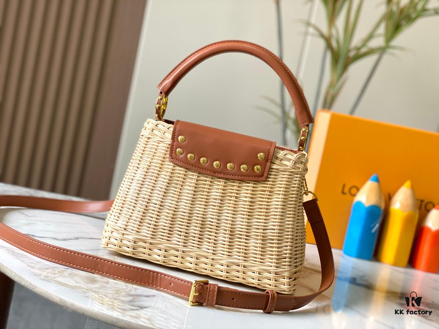 693073756e68136f4d9a5f1f Upgraded M11617 Capucines BB Handbag featuring a woven rattan design inspired by the 1892 Louis Vuitton picnic trunk