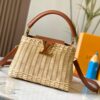 693073766e68136f4d9a5f22 Upgraded M11617 Capucines BB Handbag featuring a woven rattan design inspired by the 1892 Louis Vuitton picnic trunk