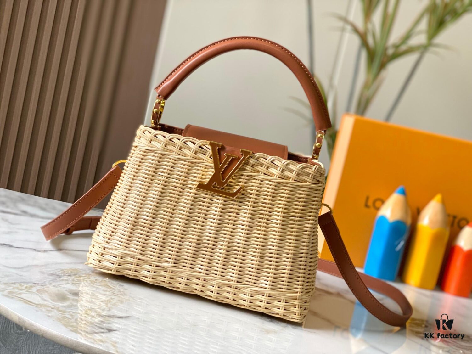 693073766e68136f4d9a5f22 Upgraded M11617 Capucines BB Handbag featuring a woven rattan design inspired by the 1892 Louis Vuitton picnic trunk