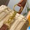 693073766e68136f4d9a5f23 Upgraded M11617 Capucines BB Handbag featuring a woven rattan design inspired by the 1892 Louis Vuitton picnic trunk