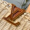 693073766e68136f4d9a5f24 Upgraded M11617 Capucines BB Handbag featuring a woven rattan design inspired by the 1892 Louis Vuitton picnic trunk