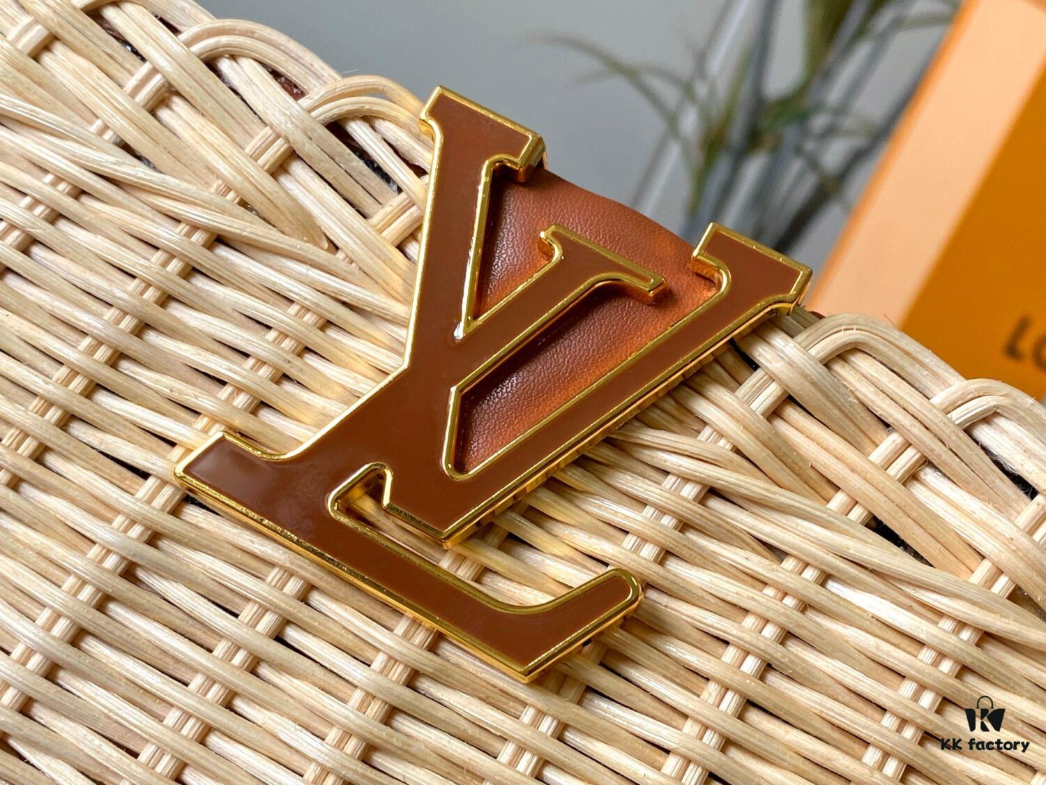 693073766e68136f4d9a5f24 Upgraded M11617 Capucines BB Handbag featuring a woven rattan design inspired by the 1892 Louis Vuitton picnic trunk