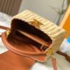 693073786e68136f4d9a5f26 Upgraded M11617 Capucines BB Handbag featuring a woven rattan design inspired by the 1892 Louis Vuitton picnic trunk