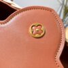 693073796e68136f4d9a5f27 Upgraded M11617 Capucines BB Handbag featuring a woven rattan design inspired by the 1892 Louis Vuitton picnic trunk
