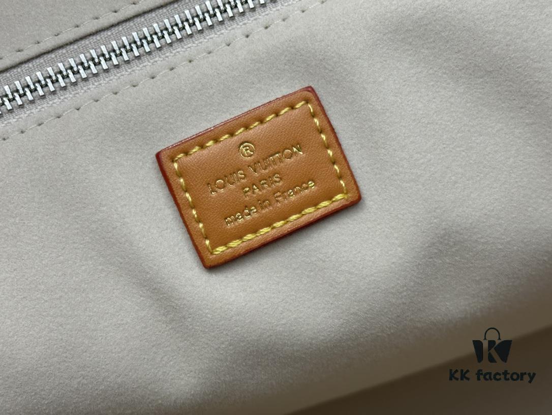 693073bf6e68136f4d9a5fb3 M24457 This Shopper Medium Bag Draws Inspiration from Louis Vuitton's Shopping Tote