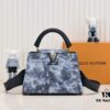 693074456e68136f4d9a60d0 Upgraded Black M21725 Louis Vuitton x Yayoi Kusama New Collaboration Capsule Collection Explores the Bizarre Dreamscape of the LV x YK Capucines PM Bag, Drawing Inspiration from the Artist's 'My Eternal Soul' Series Since 2009, Featuring Encounters with Eccentric Faces and Organic Forms. Printed and Embroidered Motifs Adorn Luxurious Taurillon Leather, Making It a Distinguished Artistic Collector's Piece.
