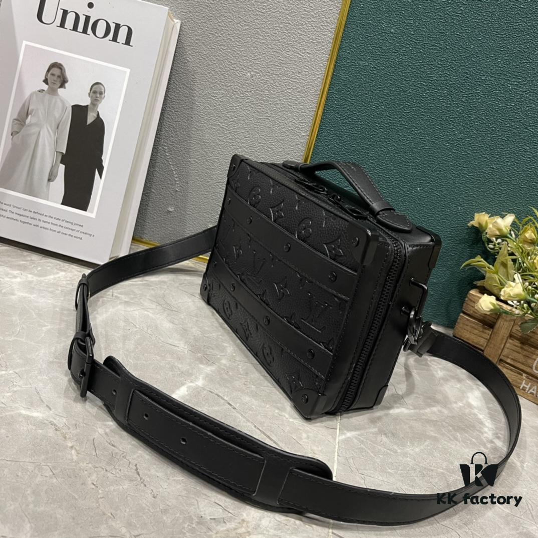 693074a96e68136f4d9a61aa Upgraded Version 🔥 M45935 59163 Handle Soft Trunk Handbag crafted from Louis Vuitton's iconic Monogram Macassar canvas, featuring stud detailing at corners and leather reinforcement straps that evoke the brand's trunk-making heritage. The sleek silhouette, paired with a detachable shoulder strap, offers effortless carry for small electronics and daily essentials. A wide opening ensures easy access to contents.