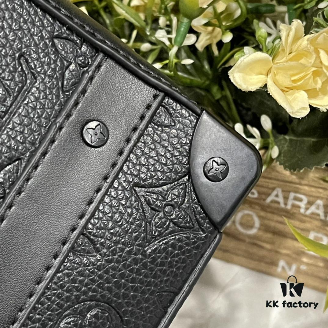 693074ab6e68136f4d9a61af Upgraded Version 🔥 M45935 59163 Handle Soft Trunk Handbag crafted from Louis Vuitton's iconic Monogram Macassar canvas, featuring stud detailing at corners and leather reinforcement straps that evoke the brand's trunk-making heritage. The sleek silhouette, paired with a detachable shoulder strap, offers effortless carry for small electronics and daily essentials. A wide opening ensures easy access to contents.