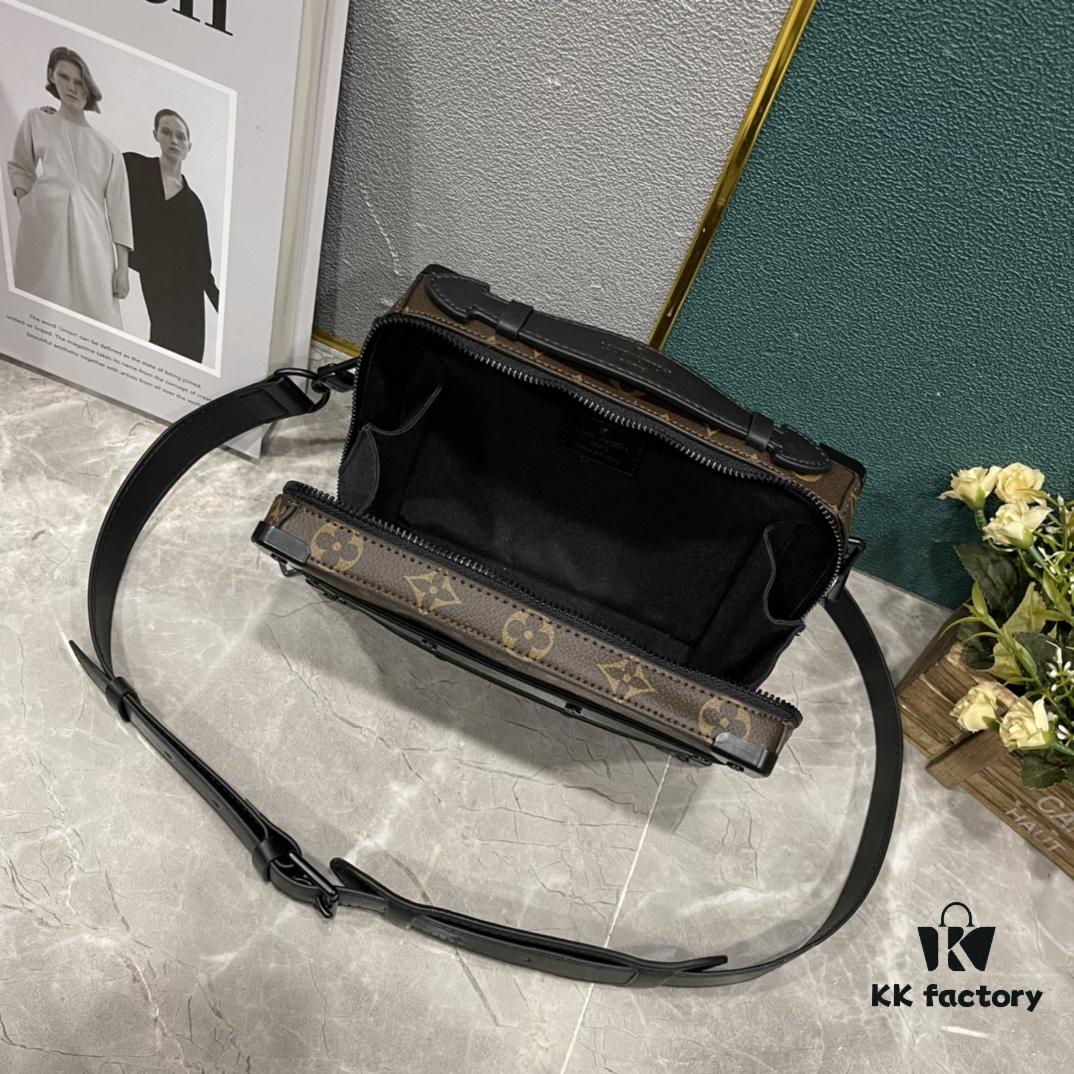 693074b06e68136f4d9a61b8 Upgraded Version 🔥 M45935 59163 Handle Soft Trunk Handbag crafted from Louis Vuitton's iconic Monogram Macassar canvas, featuring stud corners and leather reinforcement straps that evoke the brand's trunk-making heritage. Sleek silhouette with a detachable shoulder strap allows easy portability for small electronic devices and personal essentials. Wide opening facilitates convenient access to contents.