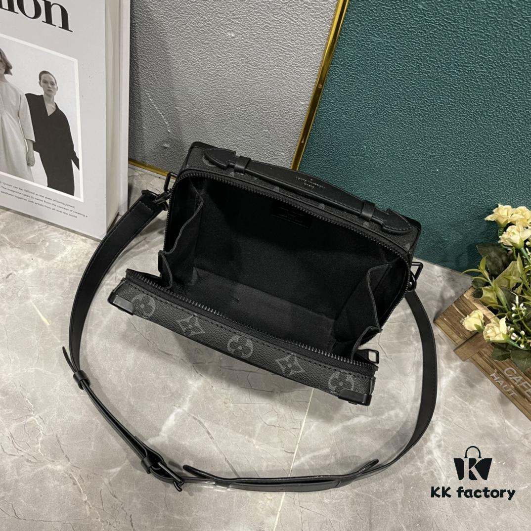 693074b46e68136f4d9a61c2 Upgraded Version 🔥 M45935 59163 Handle Soft Trunk Handbag crafted from Louis Vuitton's iconic Monogram Macassar canvas, featuring stud details at corners and leather-reinforced straps that evoke the brand's trunk-making heritage. Its clean silhouette and detachable shoulder strap offer effortless carry for small electronics and daily essentials. The wide-opening design ensures easy access to contents.