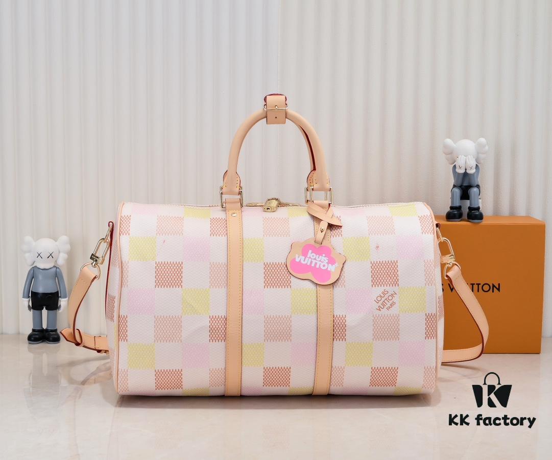 693075876e68136f4d9a636f Keepall Bandoulière 50 in Damier Golf Coated Canvas – Green Check M40667 and Pink Check M40713